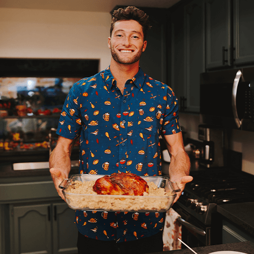 shop thanksgiving clothing - image of man wearing thanksgiving button down shirt