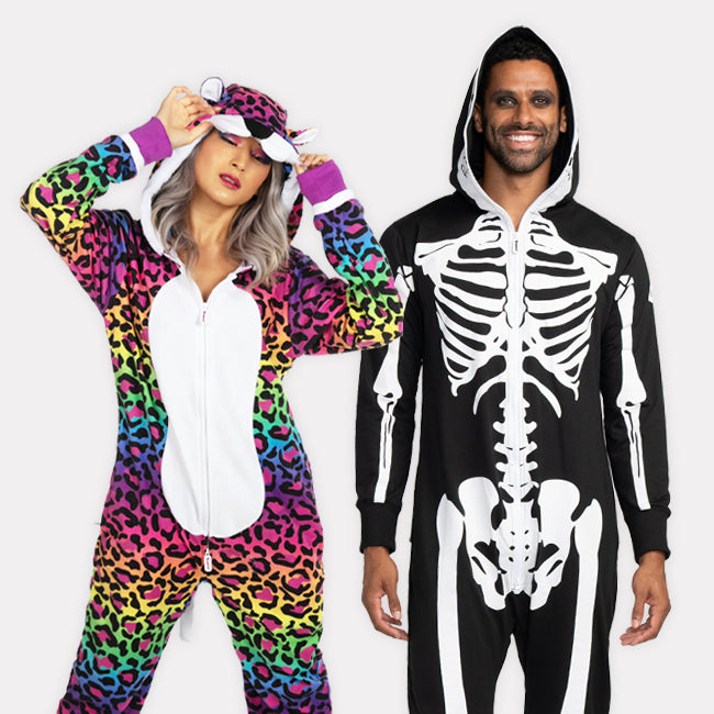 shop onesies -models wearing women's 90s leopard and men's skeleton costumes