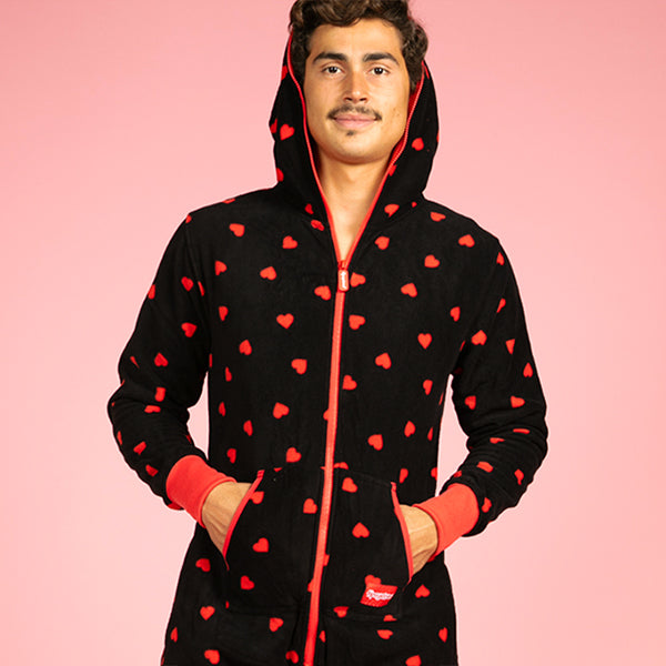 shop Valentine's Day - model wearing men's hearts on fire jumpsuit